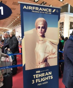 آگهی پرواز تهران و پاریس با تصویر زنی با حجاب +عکس