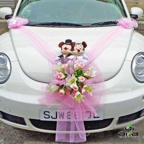 تزیین ماشین عروس با عروسک و تور 