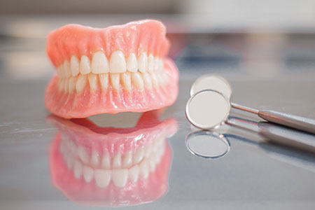 انواع دندان مصنوعی،دندان مصنوعی ثابت