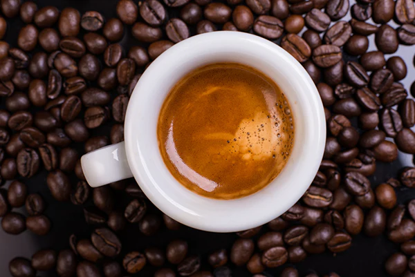 Espresso-cup-with-coffee-beans_600x.webp